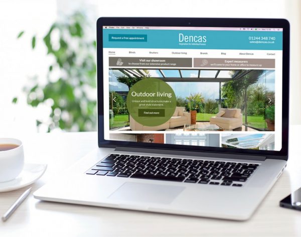 Dencas-website-on-laptop-entyce-1024x686